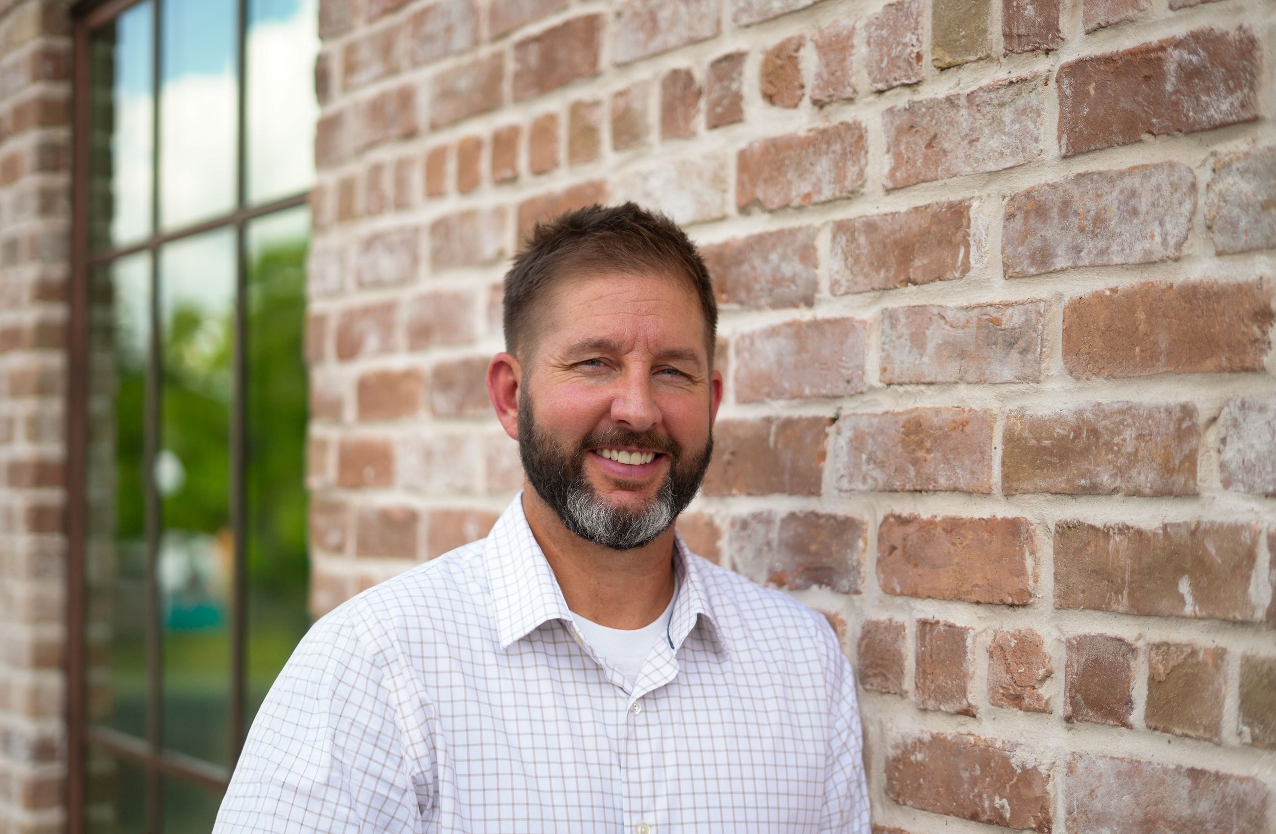Mike Laga, Vice President of Operations and Marketing at Aspire Fine Homes